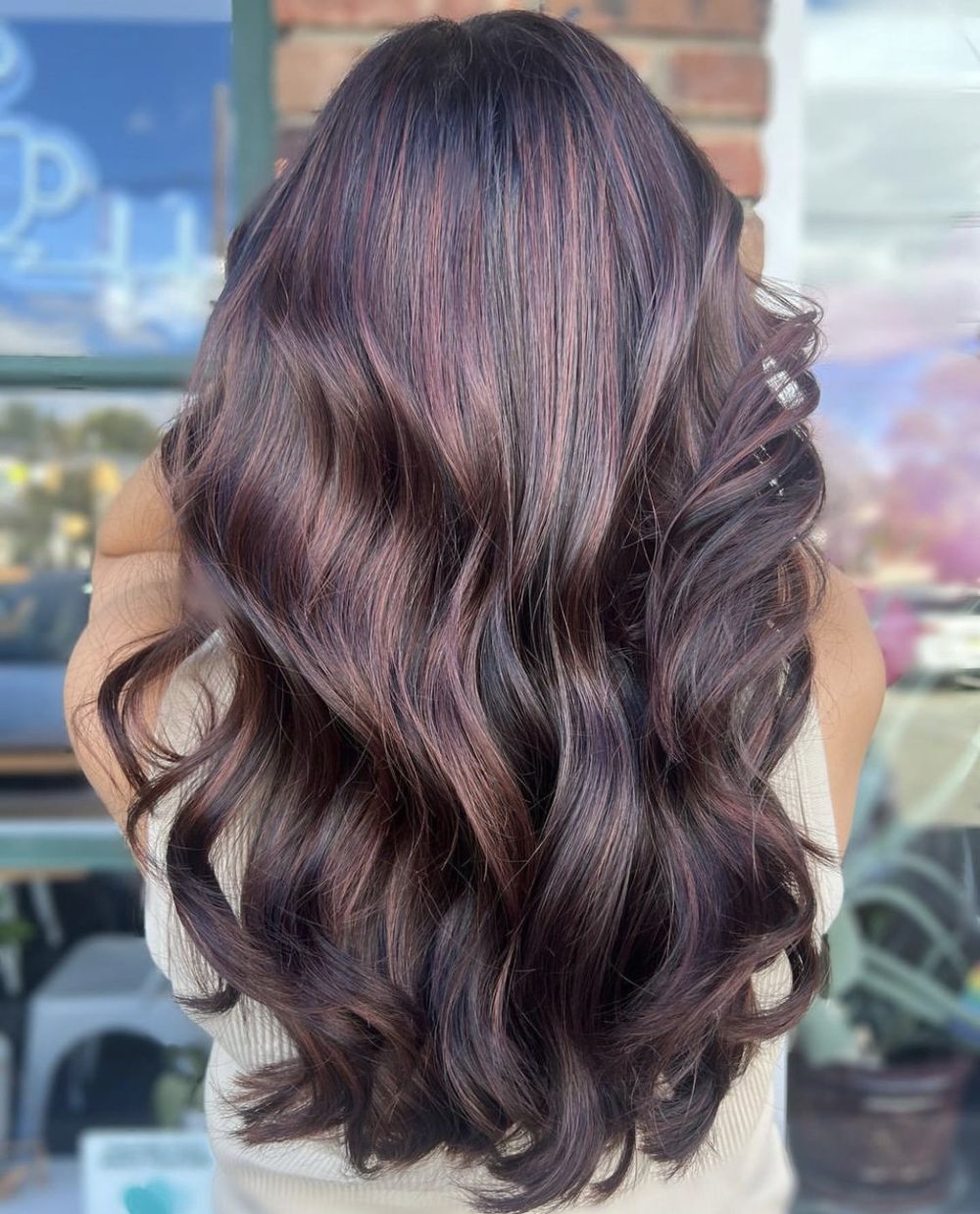 Couleur sur cheveux longs ondulés